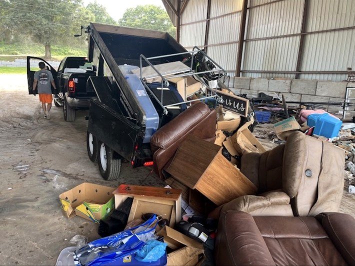 JC Junk Bros loaded trailer during a cleanout